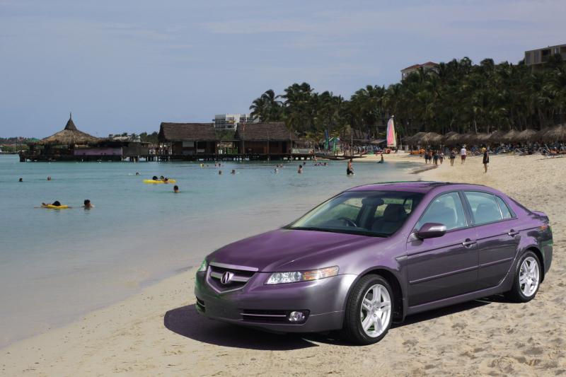 Same photo of car flipped, colored, and set on new background